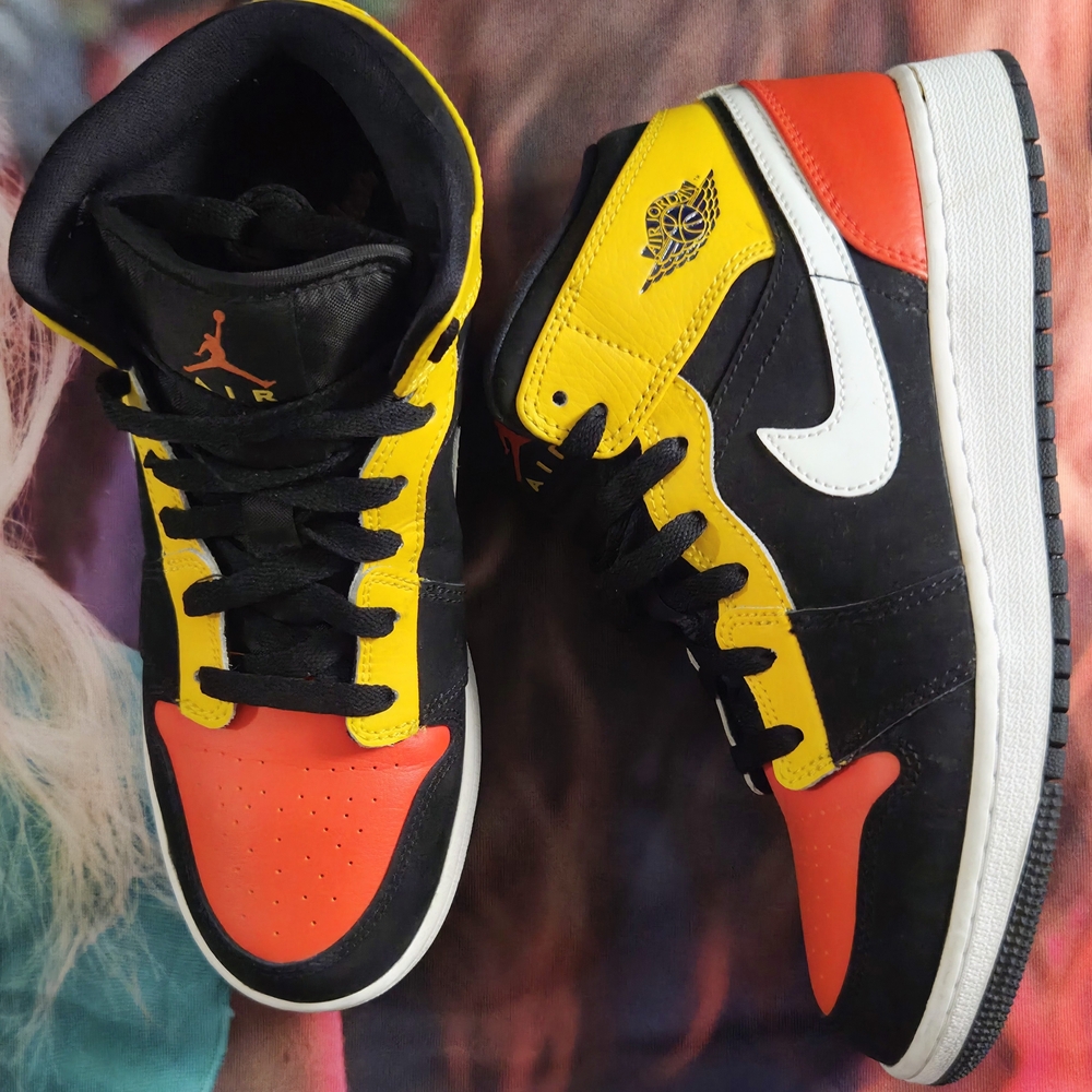 Jordan Black and Gold Sneakers